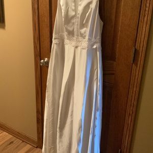 Wedding dress with inset trim at waist line